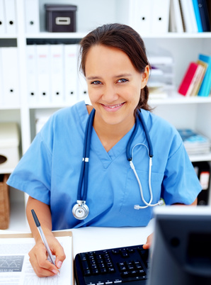 Medical - Friendly female nurse smiling happily