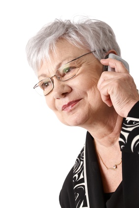 Closeup portrait of older woman with mobile phone