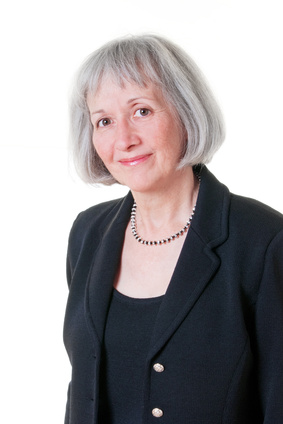Senior Business Woman Wearing Black Designer Suit