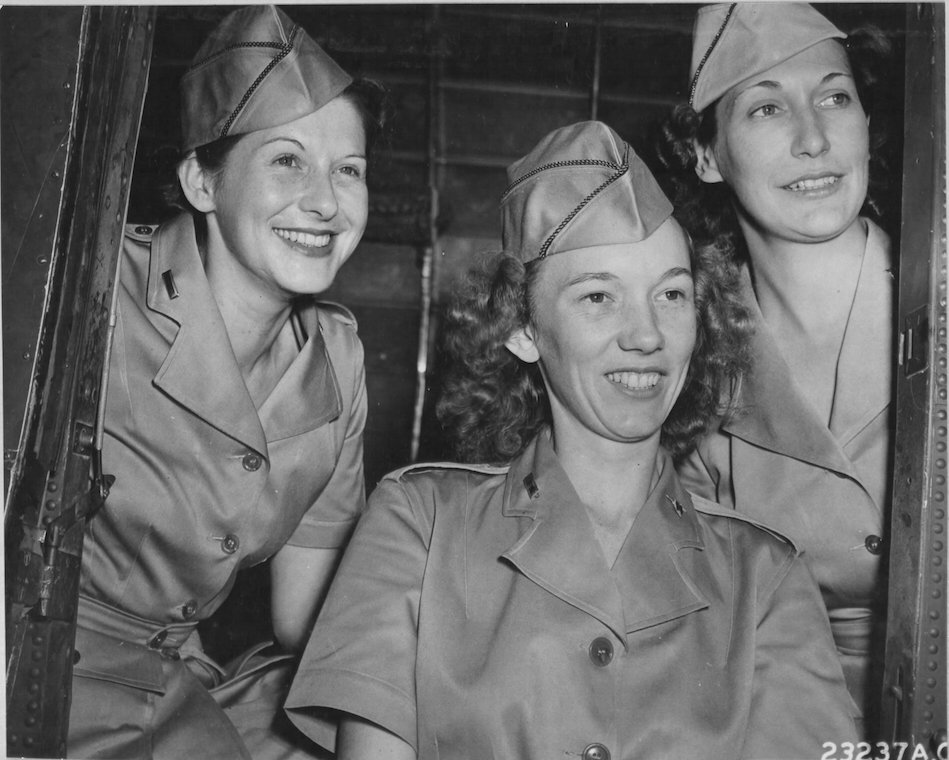 Air Base in the Caribbean. Nurse Lt. Myrtle Miller, Lansing, Mich; Nurse Lt. Jane Jordan, New Glasgow, Va.; and Nurse Lt. Irene Gukeisen, Parkston, South Dakota. Nurses thoroughly trained in jungle rescue work and in evacuation of wounded by air.