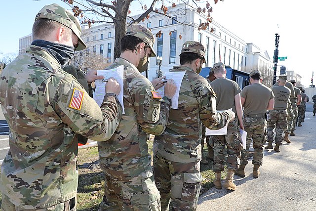 Photo: Soldiers in the Maryland Army National Guard filling out the paperwork to receive the COVID-19 vaccine