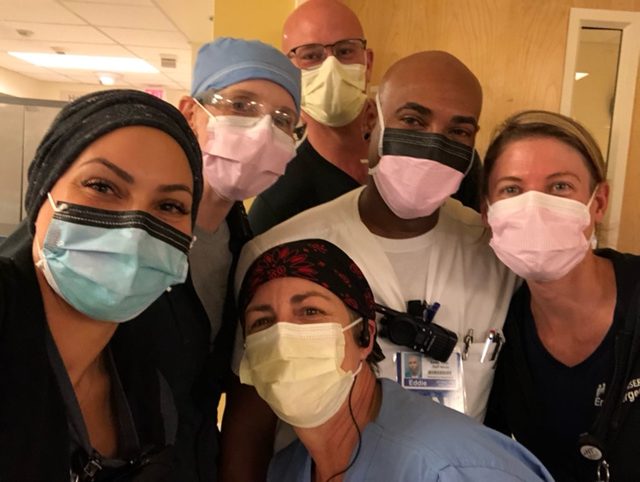 photo contest winner Eddie Johnson with colleagues