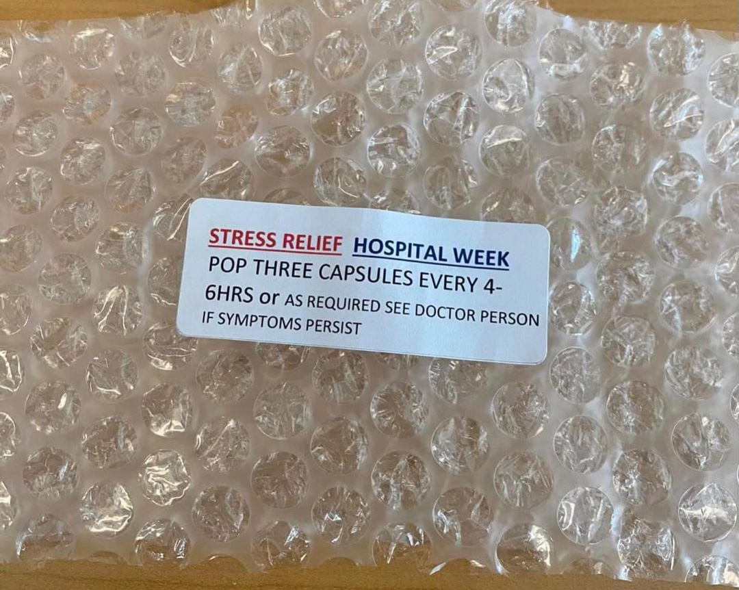 Bubble wrap with a mock prescription label: stress relief, pop three capsules every 4-6 hours